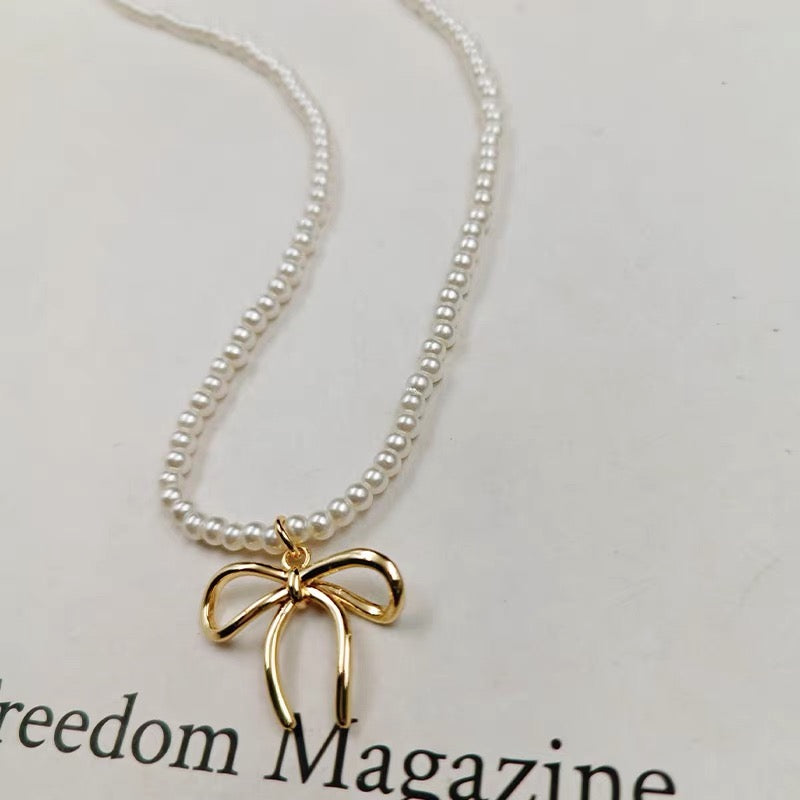 Chérie Seed Pearl Bow Pendant Necklace
